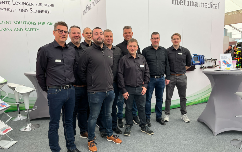 Messestand und Mitarbeiter von Mefina Medical auf der Rettmobil